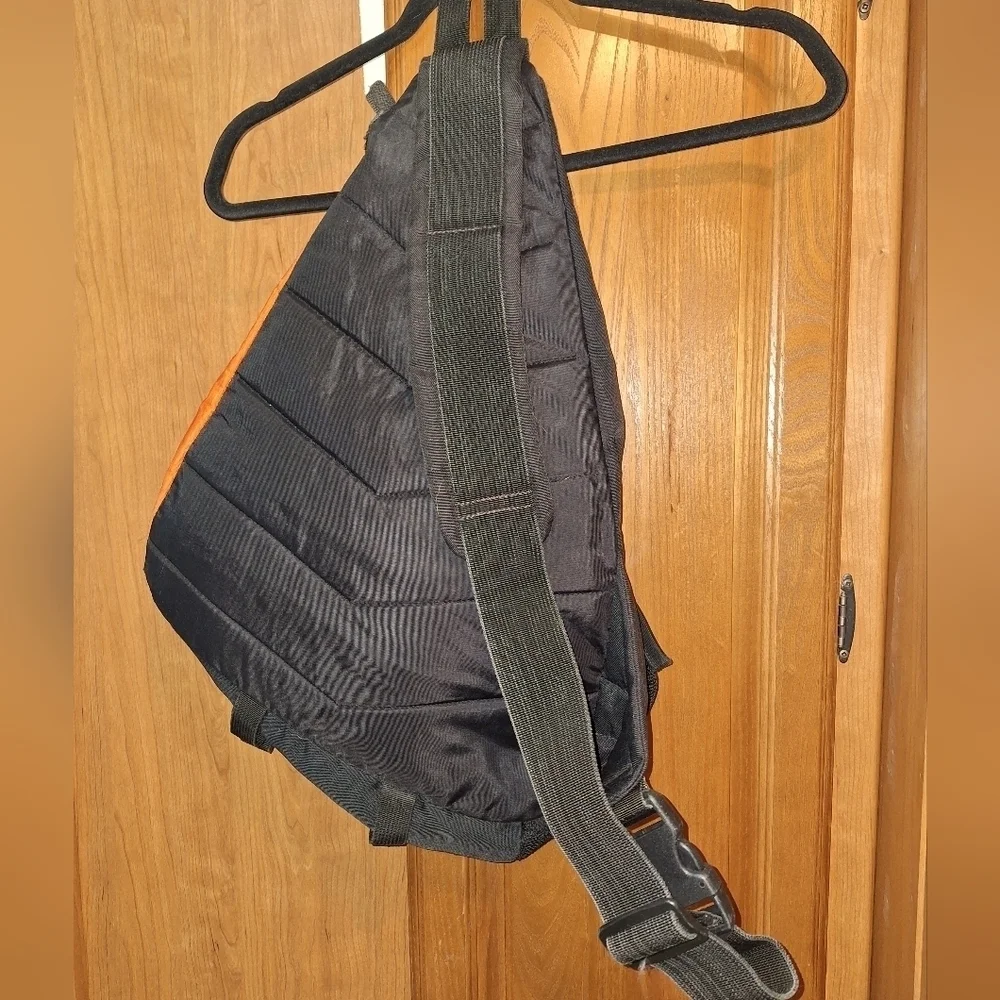 Old Navy orange large sling bag. Pre-owned but in good condition.